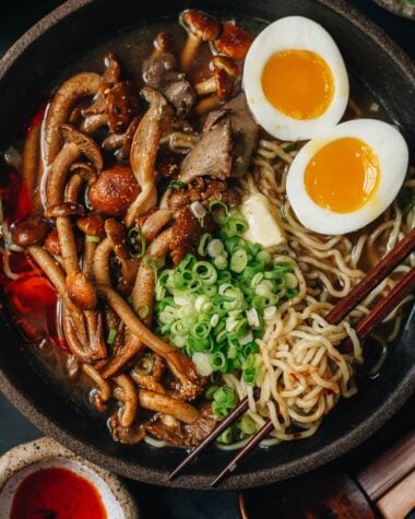 Bowl of noodle soup with mushrooms and eggs